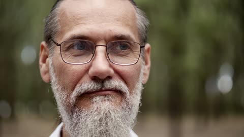 Old man with glasses portrait