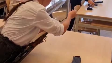 Kids In A School in Crimea Learn to Break Down an AK