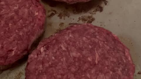 Cooking Walmart Marketside brand Wagyu 1/3 pound beef burger 3 pack that costs $6.67 per pack