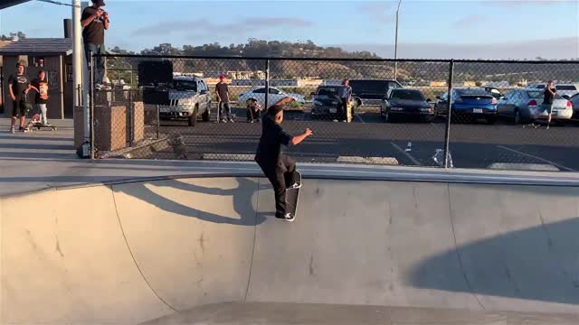 Skateboarder Fell over Fence Doing a Trick