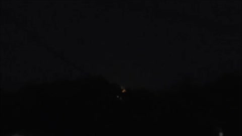 Beautiful full moon rising from the trees