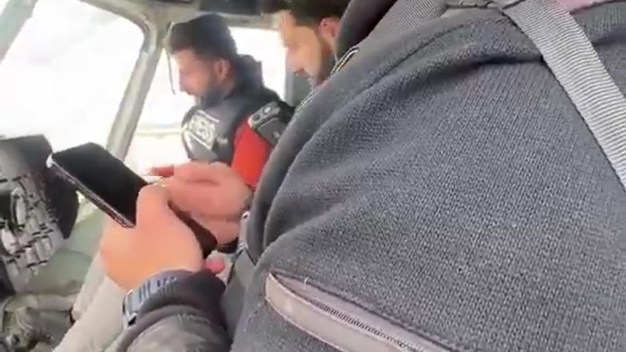 Rebels in Syria attempting to fly a military chopper by watching a YouTube video.