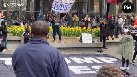 Trump supporters and protestors waiting for his arrival at the Manhattan Courthouse