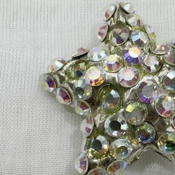 Handmade Unique 1.25” Clip On Earrings Made with Swarovski Crystal AB. Star