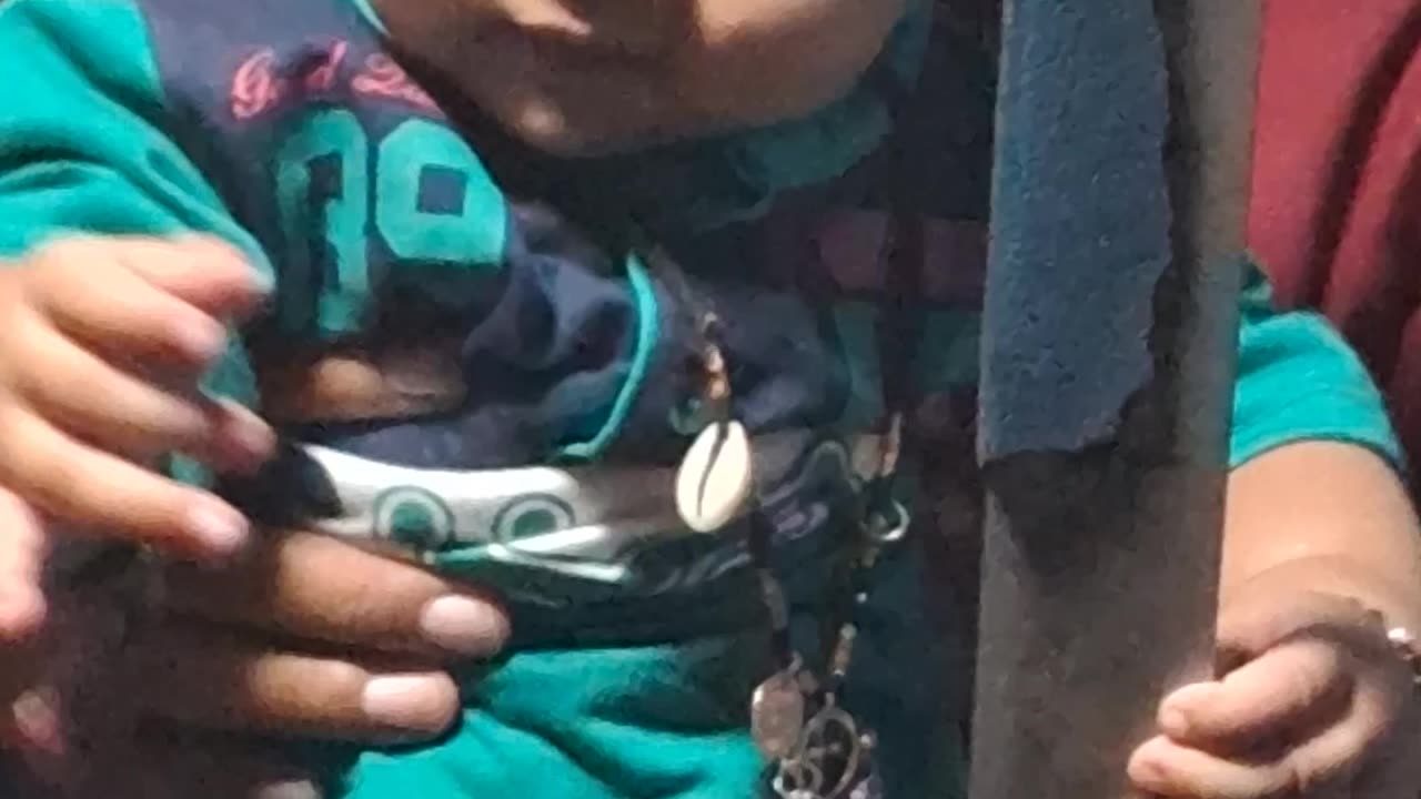Funny baby in train