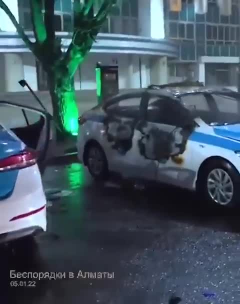Kazakhstan - Citizens destroying Police Cars in Aktobe