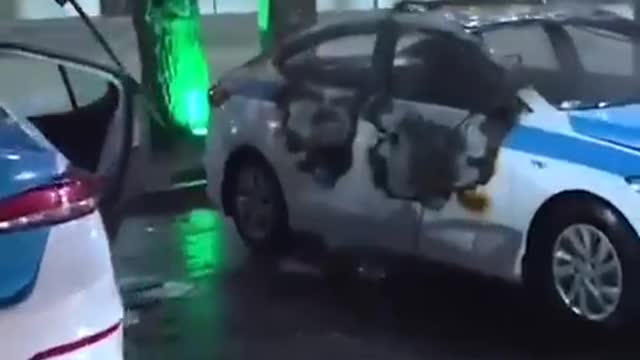 Kazakhstan - Citizens destroying Police Cars in Aktobe