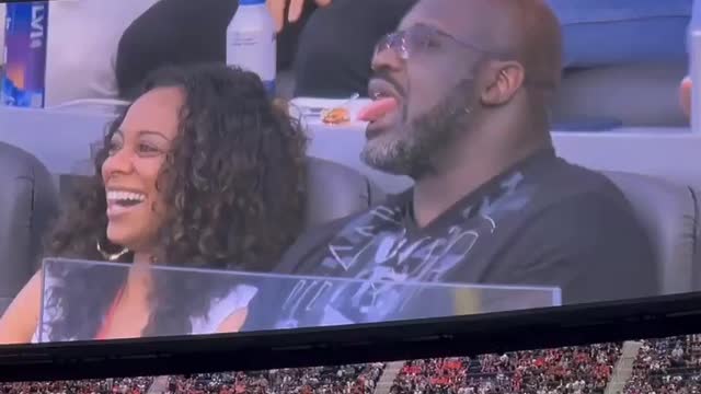 Shaq sticks his tongue out on the Jumbotron at Super Bowl