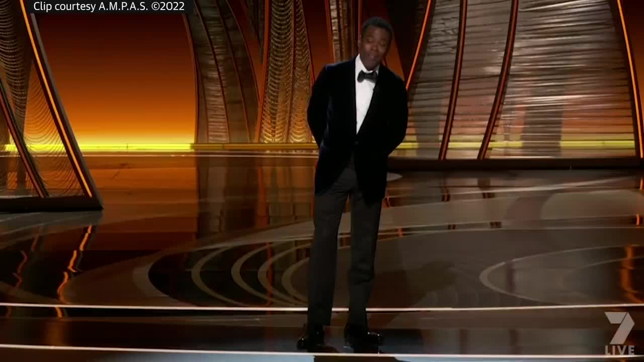 Watch the uncensored moment Will Smith smacks Chris Rock on stage at the Oscars, drops F-bomb