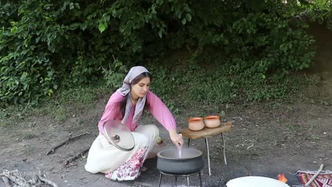 Cooking broth with local teak bread in the village!