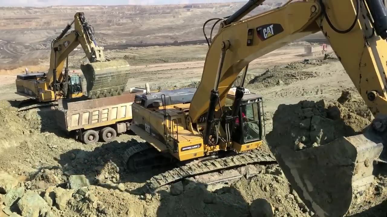 Caterpillar 375 & Caterpillar 385C Excavators Loading Trucks - Sotiriadis_Labrianidis Mining Works