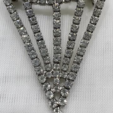 Rhodium Plated 2” x 1.3” Diamond Shape Brooch. Made with Swarovski Crystal