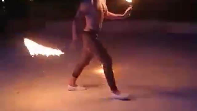 The man playing with fire