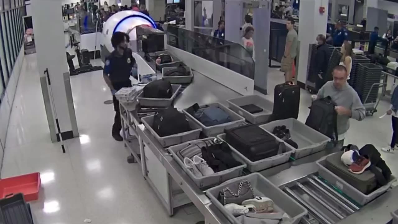 TSA Agents caught on surveillance video stealing from passengers’ bags at Miami airport.