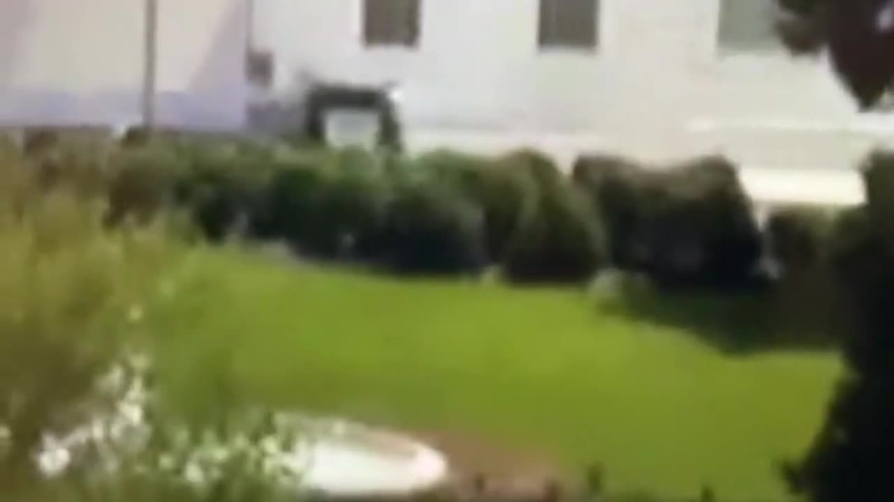 THE WHITE HOUSE 2 MEN CARRYING WHAT LOOKS LIKE A CASKET TO BEHIND THE SECURITY SCREEN