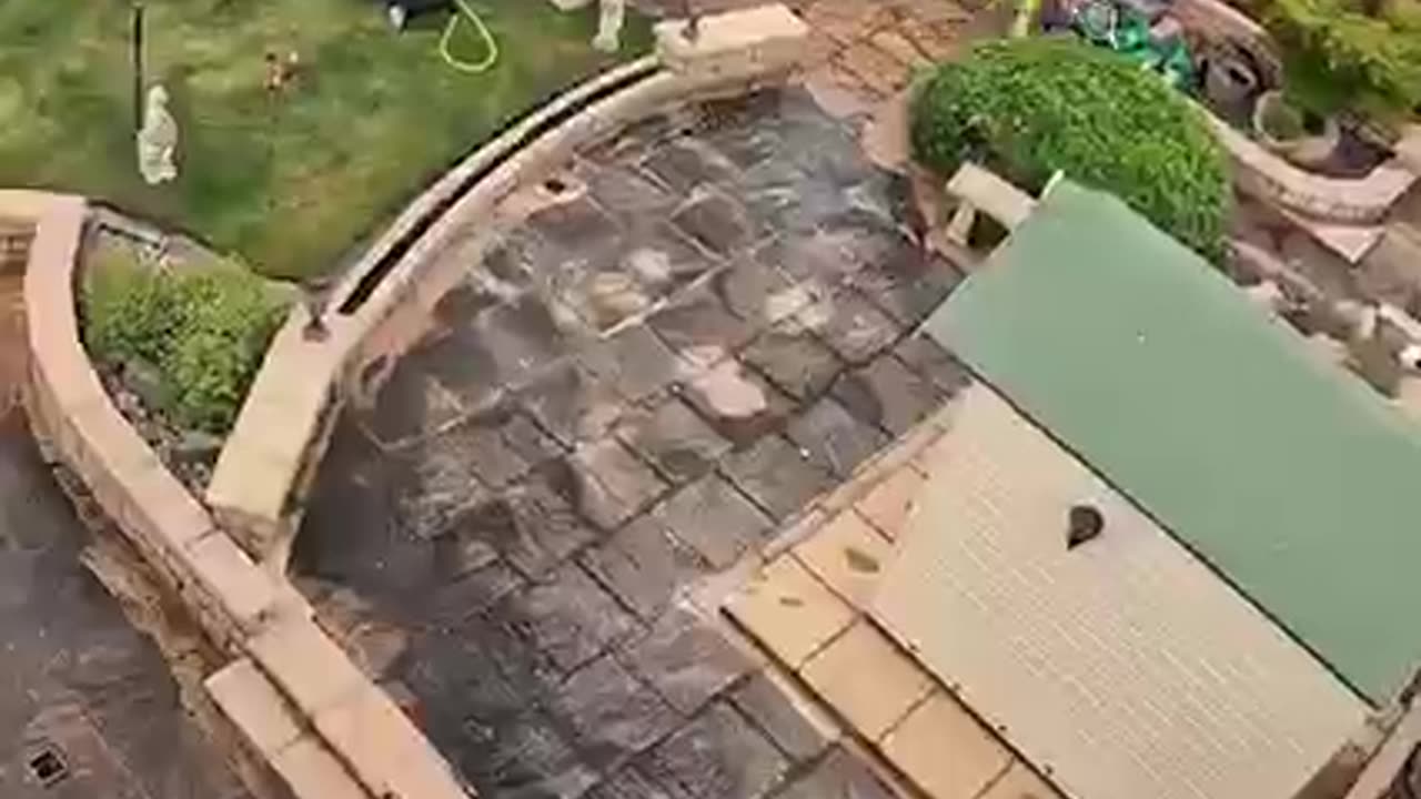 A great view of a FILTHY patio transformation.