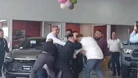 Employees brawling at a Toyota dealership in Milpitas, California.