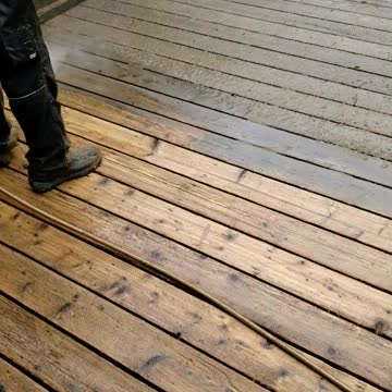 Power washing a deck