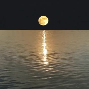 Soothing View of Moon Rise From Sea