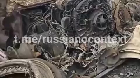 Russian Soldiers Examine What's Left of Their T80 Tank with Bewilderment