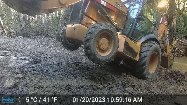 580N Backhoe Wheelie