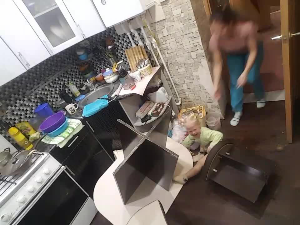 Child Watching Cartoons on Unstable Table Falls