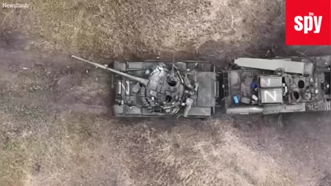 Ukrainian Drone Drops Perfect Bomb Into Russian Tank