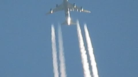 Close up of plane spraying whatever it is they spray