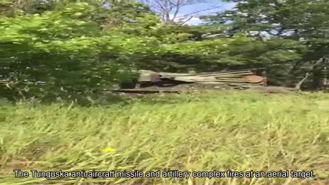 The Tunguska anti-aircraft missile and artillery complex fires at an aerial target.