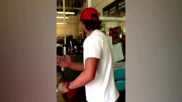 Newly-signed baseball player surprises dad at work