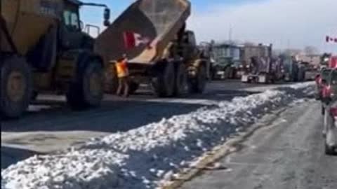 Big mining dump trucks now joining convoy with tractors. WOW. Lets go. People are pissed