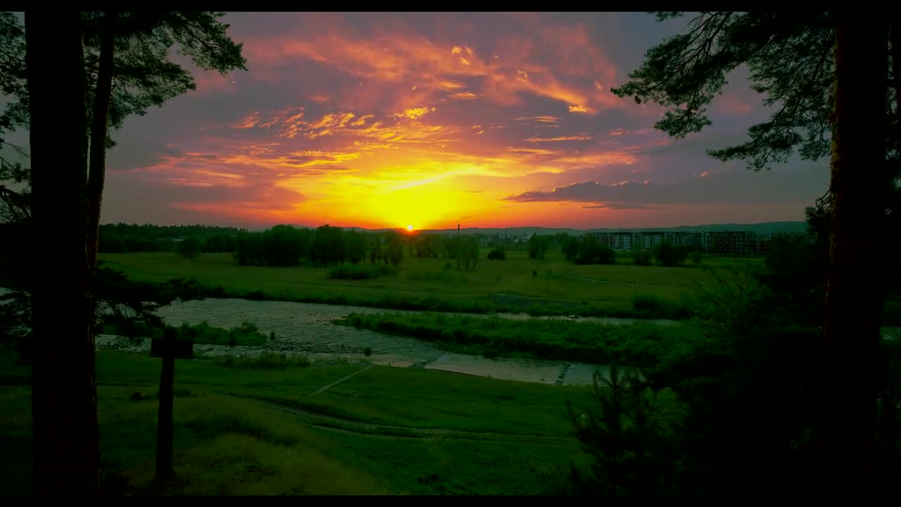 Golden July Sunset in Nowy Targ: Nature's Ballet of Light