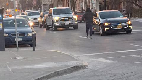 "Crazy" guy walking in the middle of the road