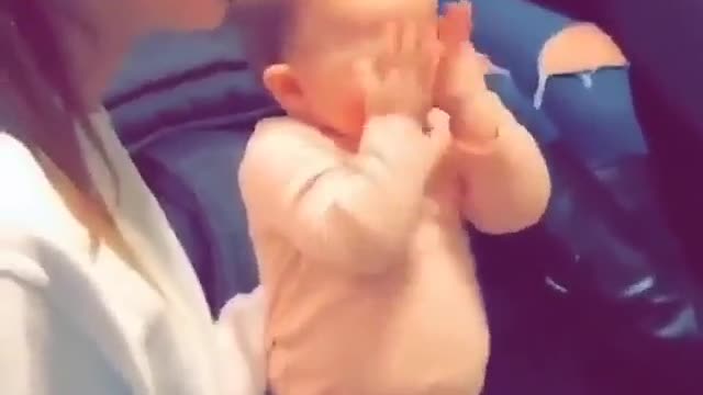 Adorable baby surprised when he see a Big toy car gift.