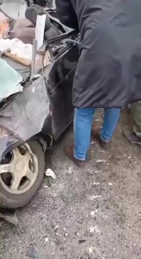 Driver unscathed from his car crushed by a Russian Strela 10