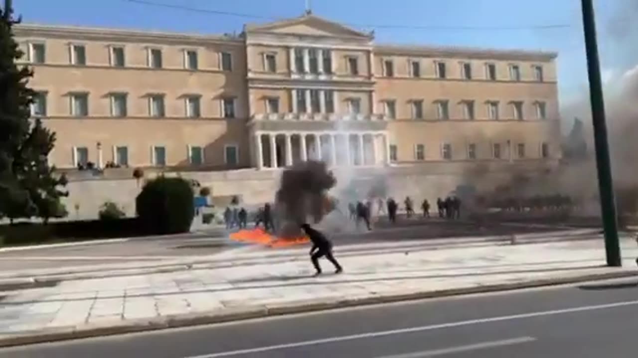 Molotov cocktails rain down in front of the parliament in Athens