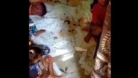 CHILDREN MAKING MASKS