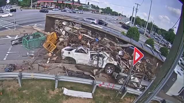 Traffic Cam Video Semi Trailer Spills Load