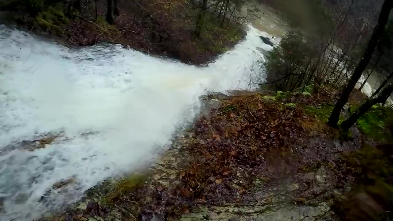 Paddlers insane waterfall ride