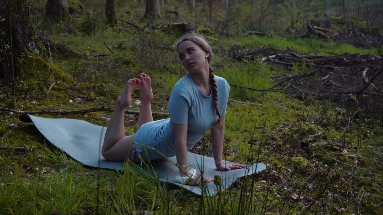 YOGA IN A GREY TIGHT DRESS