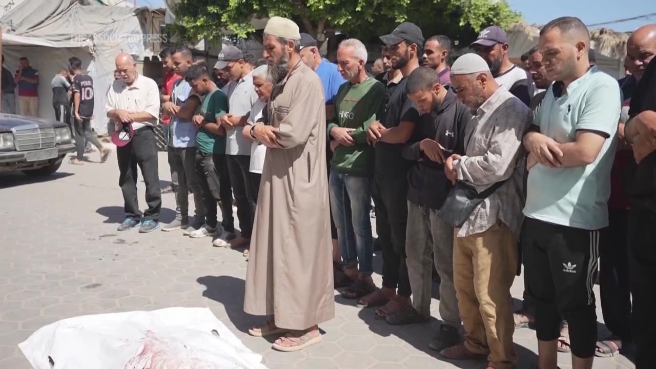 Funeral prayers outside Gaza hospital after at least seven killed in latest Israeli bombardment