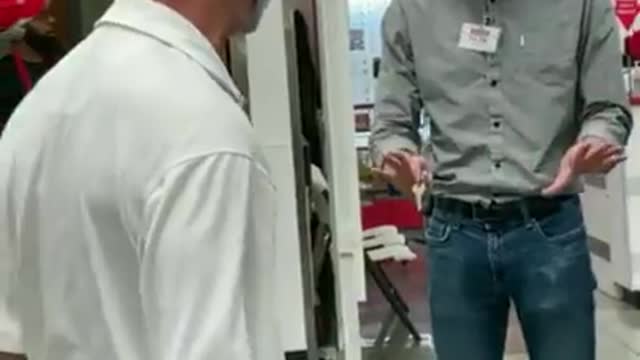 Brainwashed masker shoves and threatens Costco employees with pepper spray because they are not wearing masks.