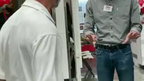 Brainwashed masker shoves and threatens Costco employees with pepper spray because they are not wearing masks.