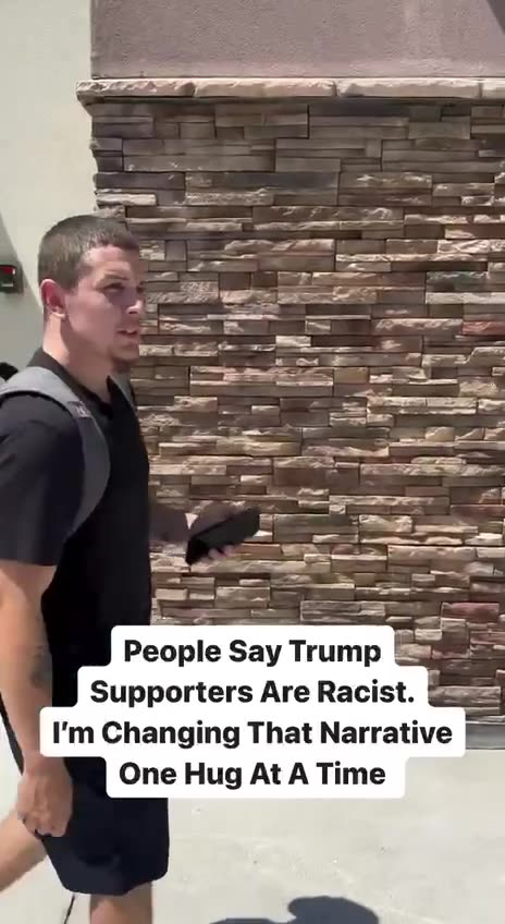 Trump supporter changing minds one hug at a time