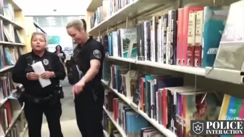 OFFICER MESS WITH THE WRONG GUY IN THE LIBRARY!