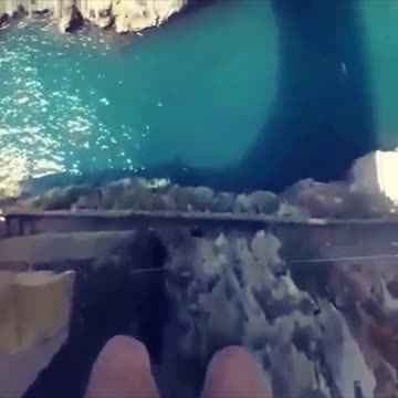 Extreme jump into the water.