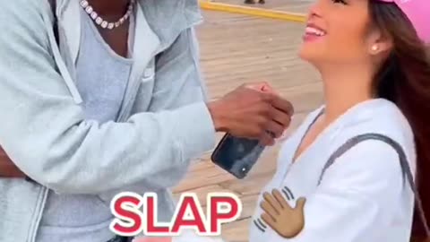 kiss or slap