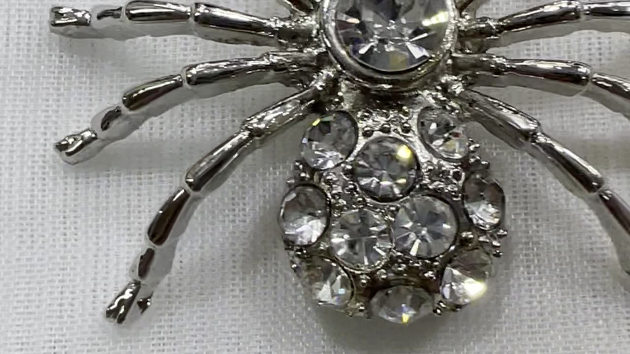 Rhodium Plated 1.75” x 1.25” Spider Brooch. Made with Austrian Crystal