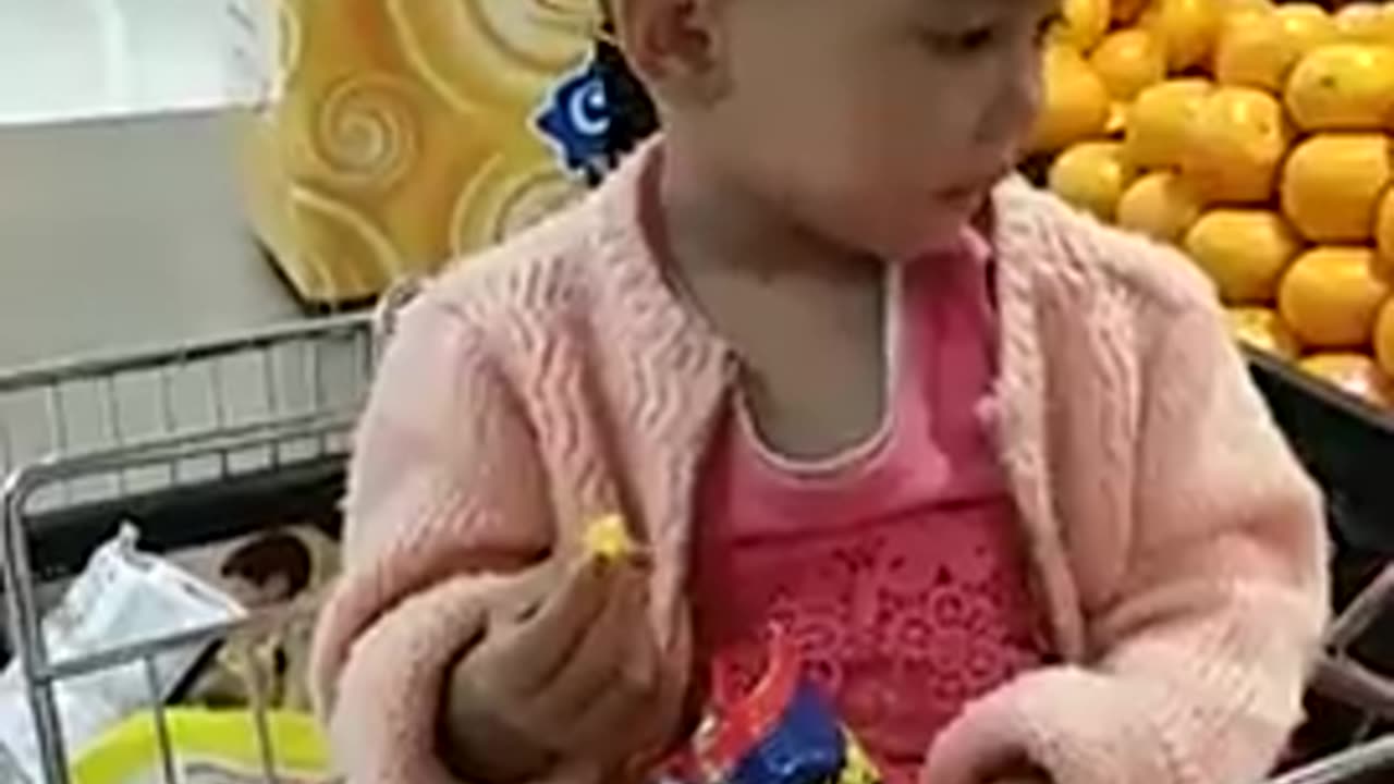 Little girl eat & sleep at the store