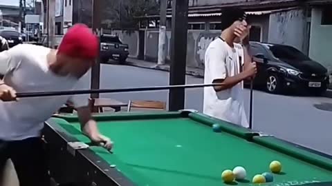 Funny video playing billiard.